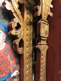 A rare Chinese gilt wood and reverse glass painted mirror, 2nd half 18th C.
