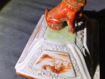 Three Chinese famille rose 'mandarin' vases and covers, Qianlong