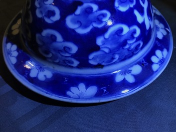 Two Chinese blue and white and famille rose vases and covers, 19/20th C.