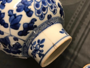 A Chinese blue and white four-piece garniture with floral design, Kangxi