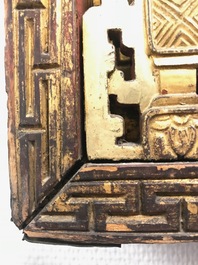 A rare Chinese gilt wood and reverse glass painted mirror, 2nd half 18th C.