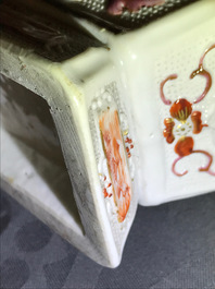 Three Chinese famille rose 'mandarin' vases and covers, Qianlong