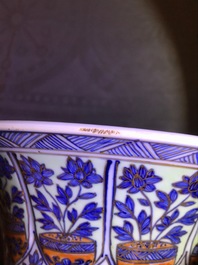 A clobbered Chinese blue and white 'gu' beaker vase, Kangxi