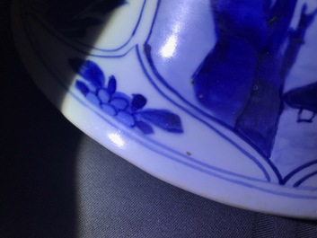 A large Chinese blue and white three-piece garniture with landscape and floral panels, Kangxi