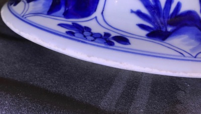 A large Chinese blue and white three-piece garniture with landscape and floral panels, Kangxi
