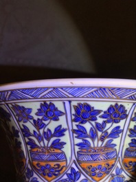 A clobbered Chinese blue and white 'gu' beaker vase, Kangxi