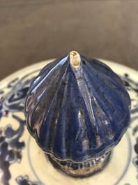 A tall Chinese blue and white 'lotus scroll' vase and cover, Kangxi