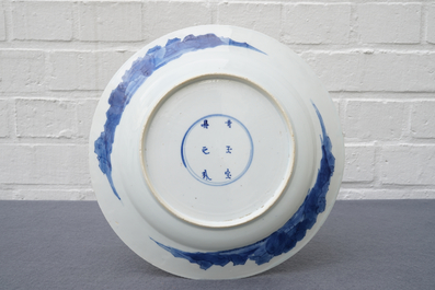 A Chinese blue and white dish with long Eliza playing music, Kangxi