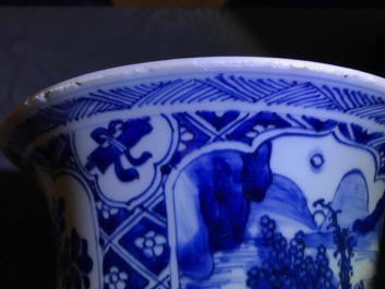 A large Chinese blue and white three-piece garniture with landscape and floral panels, Kangxi