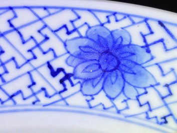 A Chinese blue and white dish with long Eliza playing music, Kangxi