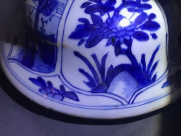 A large Chinese blue and white three-piece garniture with landscape and floral panels, Kangxi