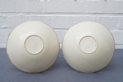 A pair of Chinese qingbai moulded 'phoenix' bowls, Song