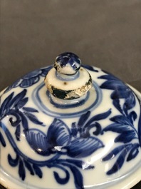 A Chinese blue and white gate-handled teapot and cover, Kangxi