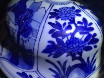 A large Chinese blue and white three-piece garniture with landscape and floral panels, Kangxi