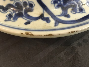 A tall Chinese blue and white 'lotus scroll' vase and cover, Kangxi