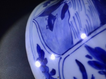 A large Chinese blue and white three-piece garniture with landscape and floral panels, Kangxi