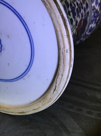 A clobbered Chinese blue and white 'gu' beaker vase, Kangxi