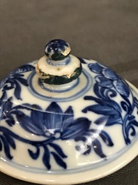 A Chinese blue and white gate-handled teapot and cover, Kangxi