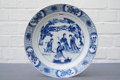 A Chinese blue and white dish with long Eliza playing music, Kangxi