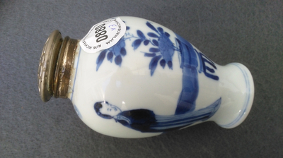 A Chinese 'milk and blood' dish, a blue and white klapmuts bowl and a tea caddy, Kangxi