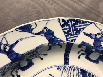 A Chinese blue and white charger with fighting horseriders, Chenghua mark, Kangxi