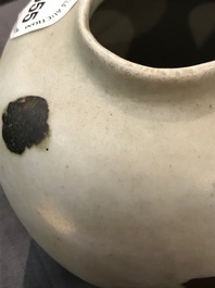 A Chinese qingbai iron spot jar, Yuan