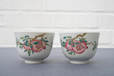 A pair of Chinese famille rose pomegranate cups, Daoguang mark, 19/20th C.
