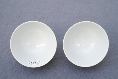 A pair of Chinese famille rose pomegranate cups, Daoguang mark, 19/20th C.