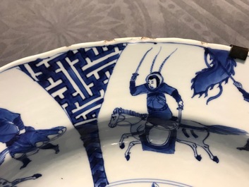 A Chinese blue and white charger with fighting horseriders, Chenghua mark, Kangxi