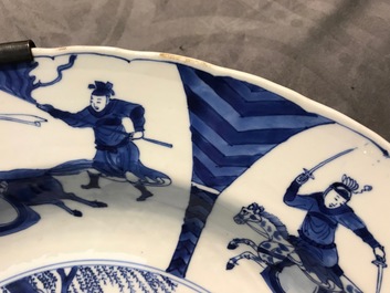 A Chinese blue and white charger with fighting horseriders, Chenghua mark, Kangxi