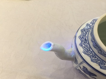 A Chinese blue and white teapot and cover with 'antiquities' design, Kangxi