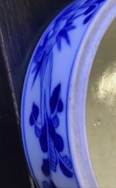 A Chinese blue and white cylindrical three-tier box, 19th C.