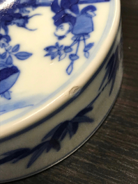 A Chinese blue and white cylindrical three-tier box, 19th C.