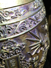 A Chinese gilt bronze bell in zitan suspension frame, Qianlong mark, 18/19th C.