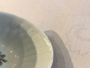 A Dutch-decorated Chinese export 'Adam &amp; Eve' cup and saucer, Yongzheng