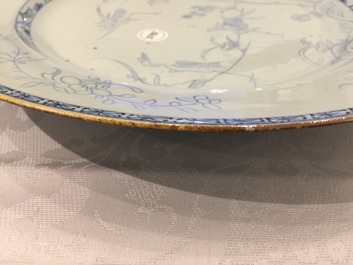 A Chinese blue and white pencil style charger with a deer and two herons, Yongzheng