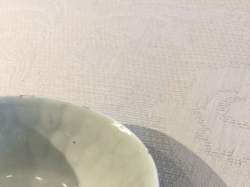 A Dutch-decorated Chinese export 'Adam &amp; Eve' cup and saucer, Yongzheng