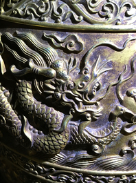 A Chinese gilt bronze bell in zitan suspension frame, Qianlong mark, 18/19th C.