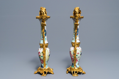 Four Chinese ormolu-mounted famille rose 'tobacco leaf' vases remodeled as two, Qianlong