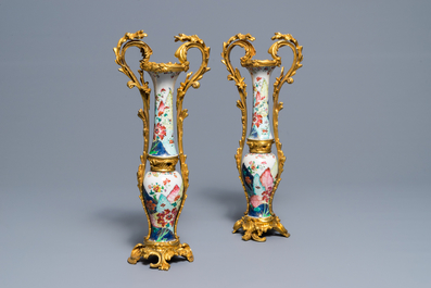 Four Chinese ormolu-mounted famille rose 'tobacco leaf' vases remodeled as two, Qianlong