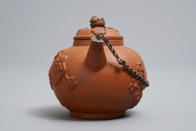 A Dutch Delft silver-mounted yixing style red earthenware teapot and cover, 1st quarter 18th C.