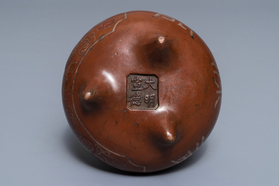 A Chinese silver-inlaid bronze incense burner, Xuande mark, 19th C.