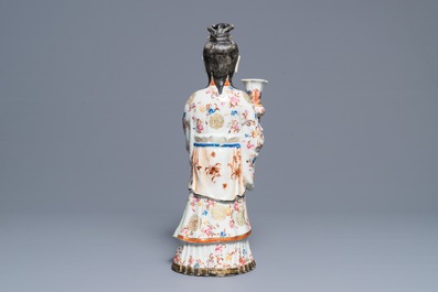 A large Chinese famille rose candle holder modelled as court lady, Qianlong