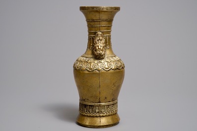 A Chinese gilt bronze vase, Xuande mark, 17/18th C.