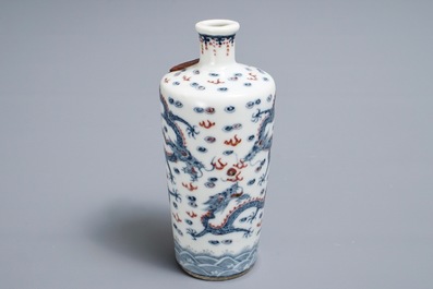 A Chinese blue, white and underglaze red 'dragon' vase, Kangxi mark, 19/20th C.