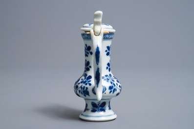 A Chinese blue and white jug and cover after a pewter example, Kangxi