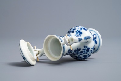 A Chinese blue and white jug and cover after a pewter example, Kangxi
