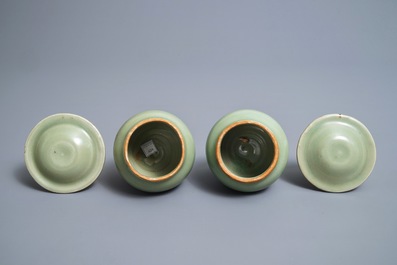 A pair of Chinese Longquan celadon vases and covers, Ming