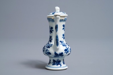 A Chinese blue and white jug and cover after a pewter example, Kangxi