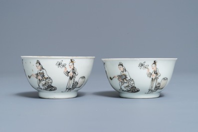 A pair of Chinese grisaille and gilt cups and saucers, Qianlong